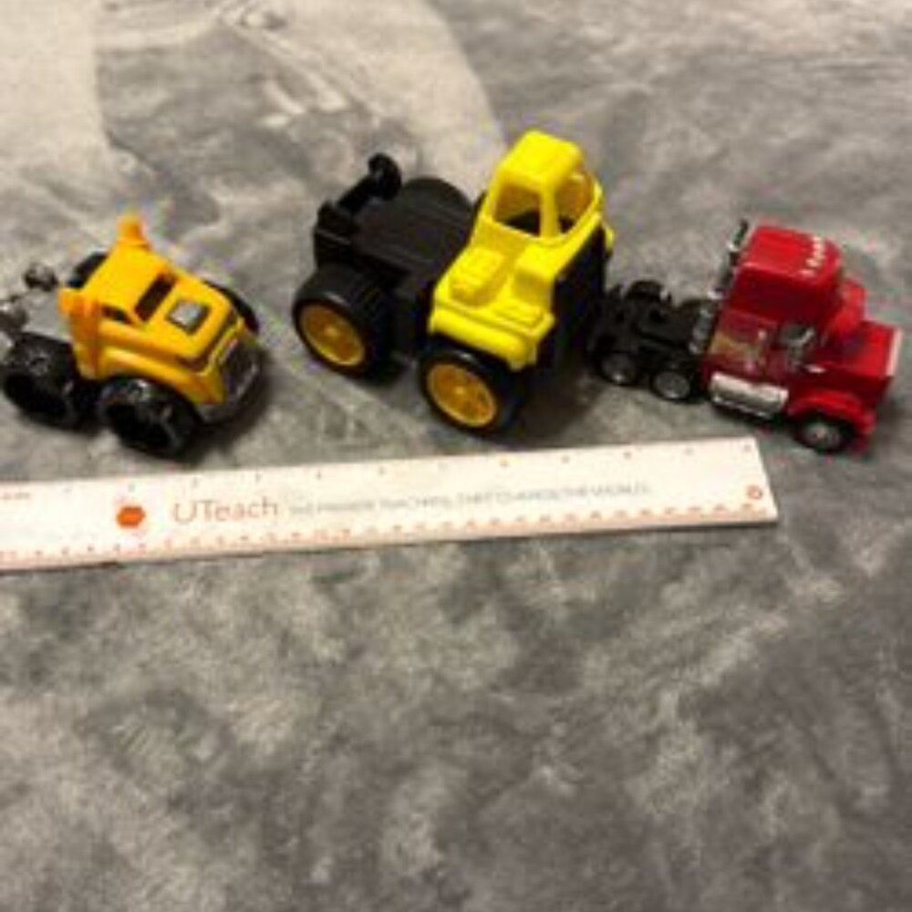 Three Toy Vehicles